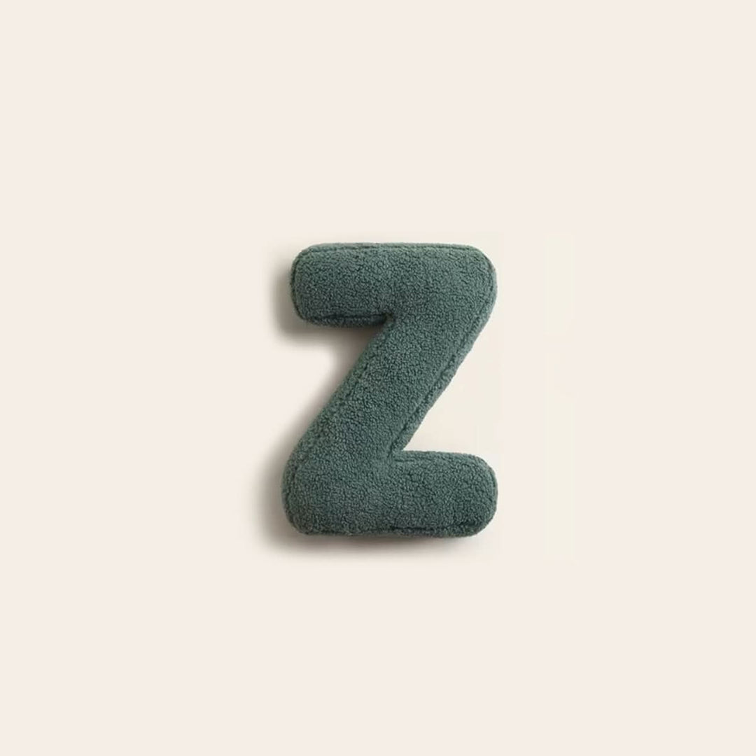 Coussin initiale Z en coton doux, touche décorative unique pour canapé ou lit.