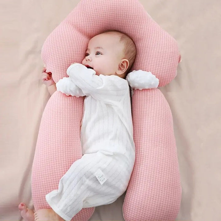 Coussin de sommeil pour nouveau-né, design ergonomique pour confort et sécurité, idéal de 0 à 12 mois.