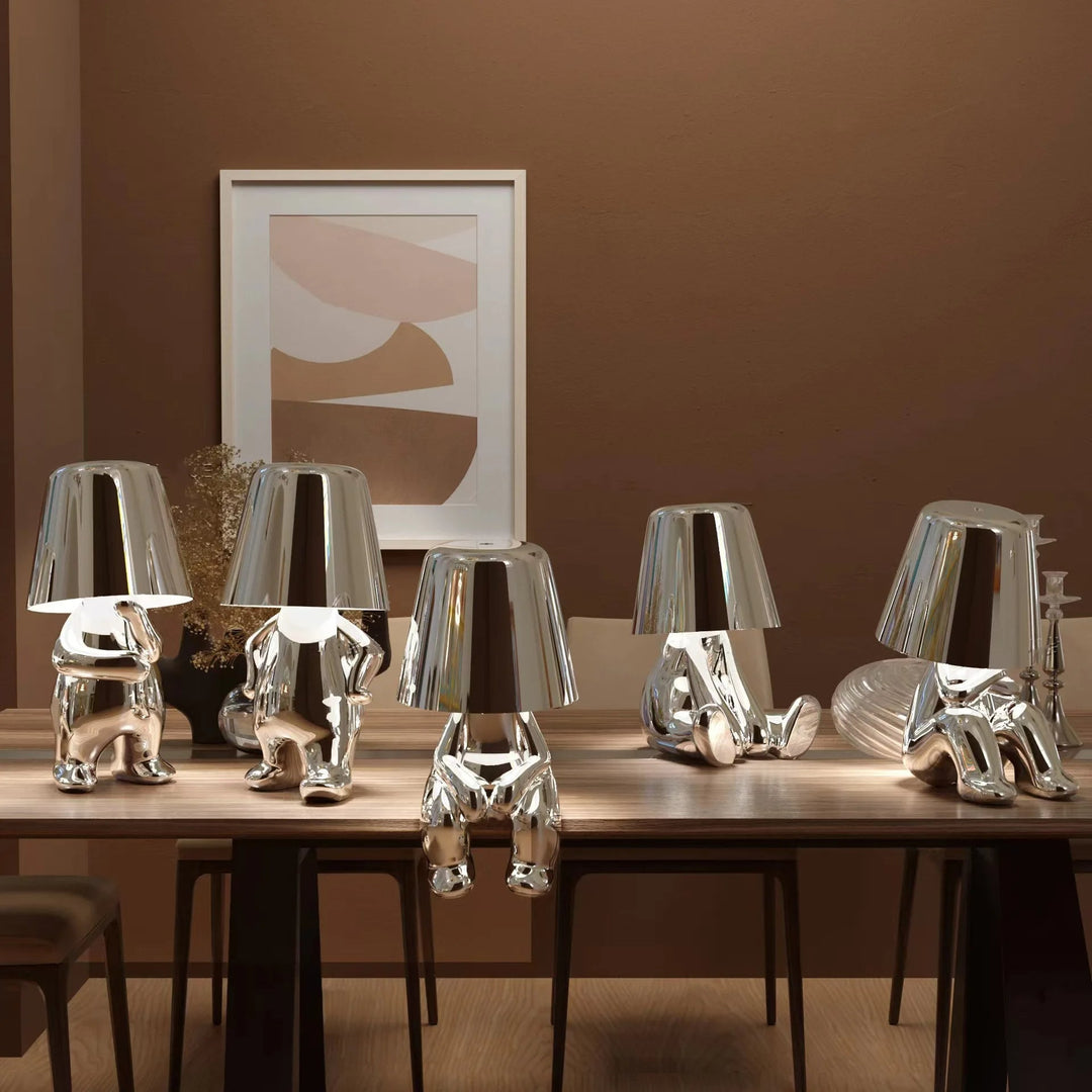 Décoration lumineuse LED, lampe de table ornement homme stylisé, design moderne pour intérieur élégant.