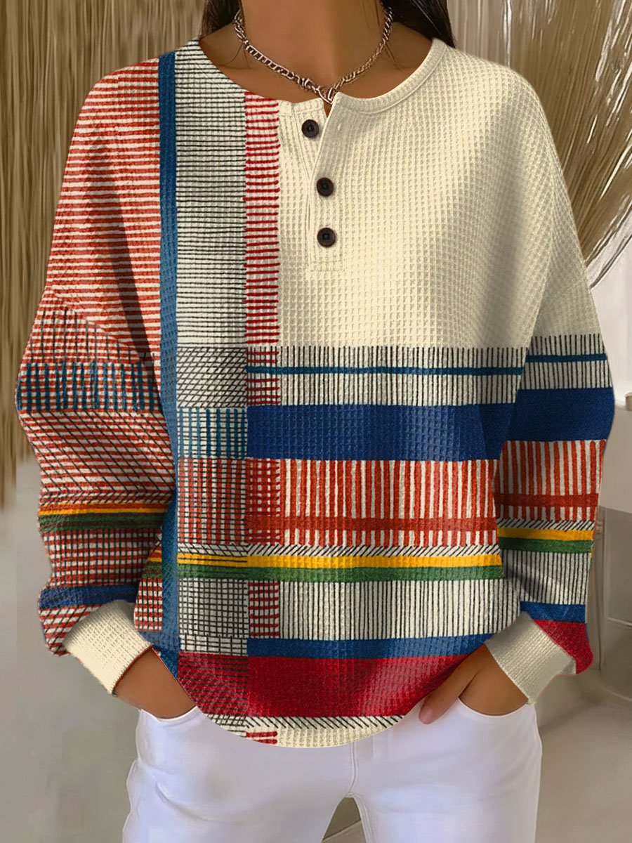 Pull femme chaud en tricot gaufré, vêtement confortable et stylé.