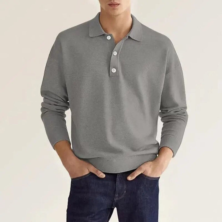 Polo homme à manches longues en coton, coupe classique élégante, parfait pour un look casual confortable.