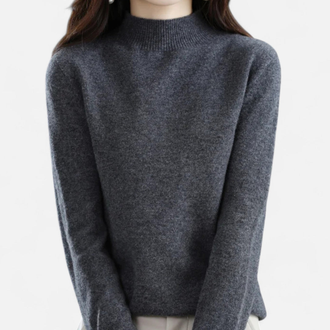 Pull col montant femme élégant, bords côte, tricot doux. Idéal hiver/automne.