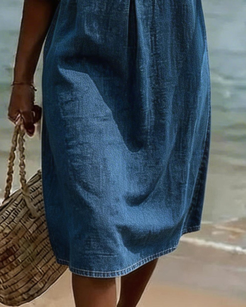 Robe décontractée femme coupe trapèze, manches volantées, idéale pour la plage et l'été.