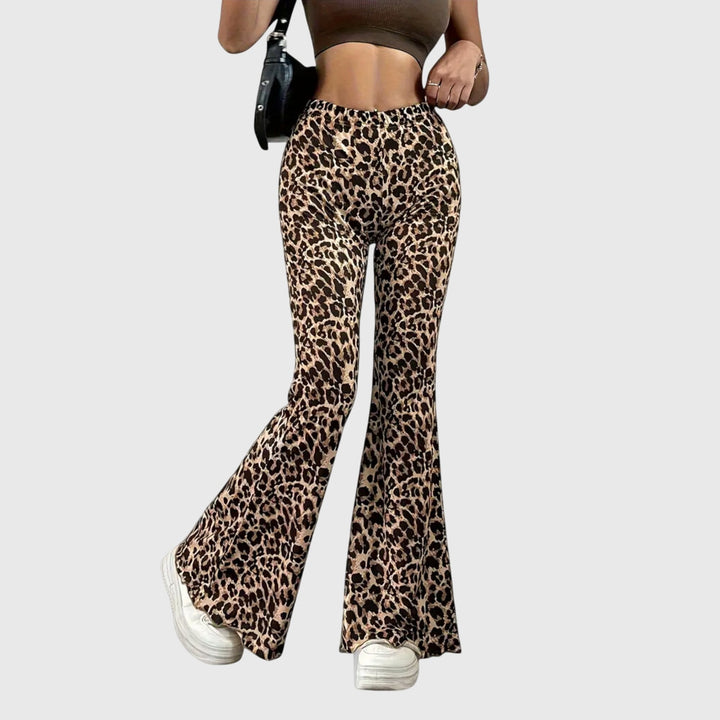 Pantalon bootcut léopard pour femme, taille haute, élégant et tendance. Idéal pour soirée ou quotidien chic.