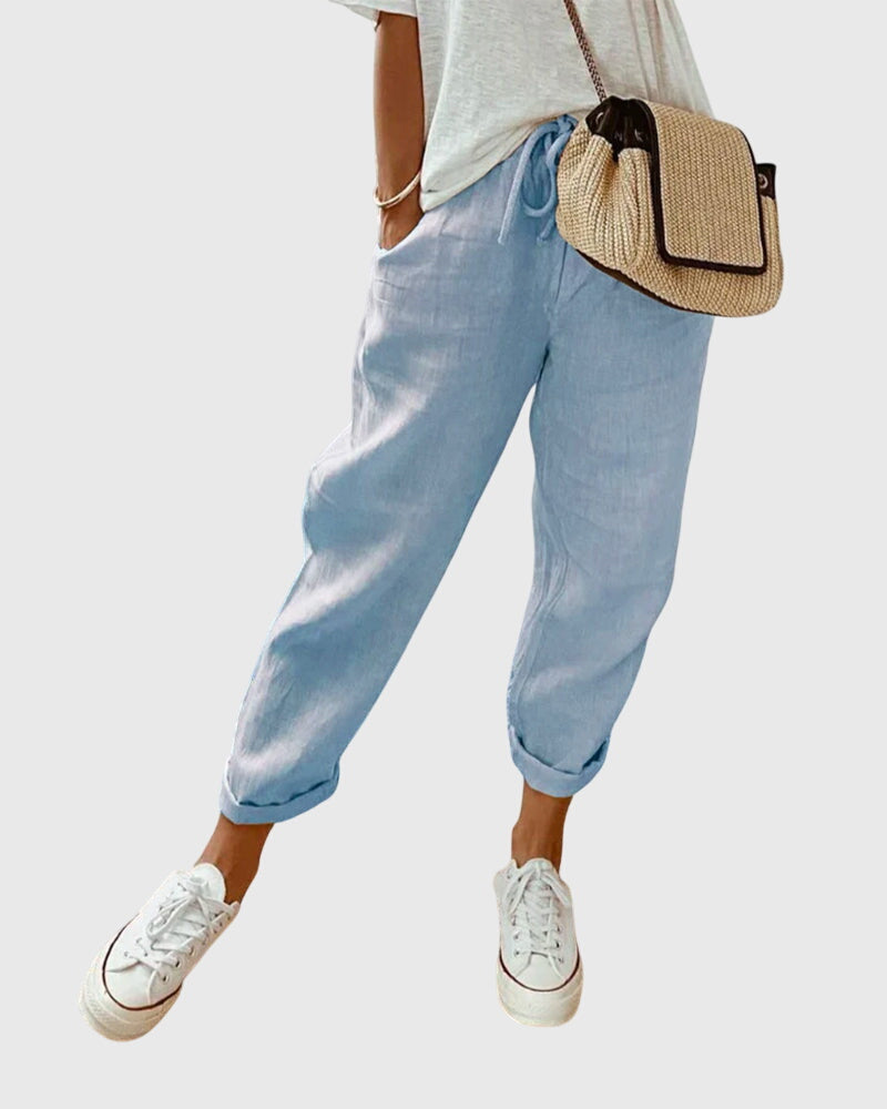 Pantalon fluide femme jambe droite, coupe raffinée, parfait pour un look décontracté ou habillé.