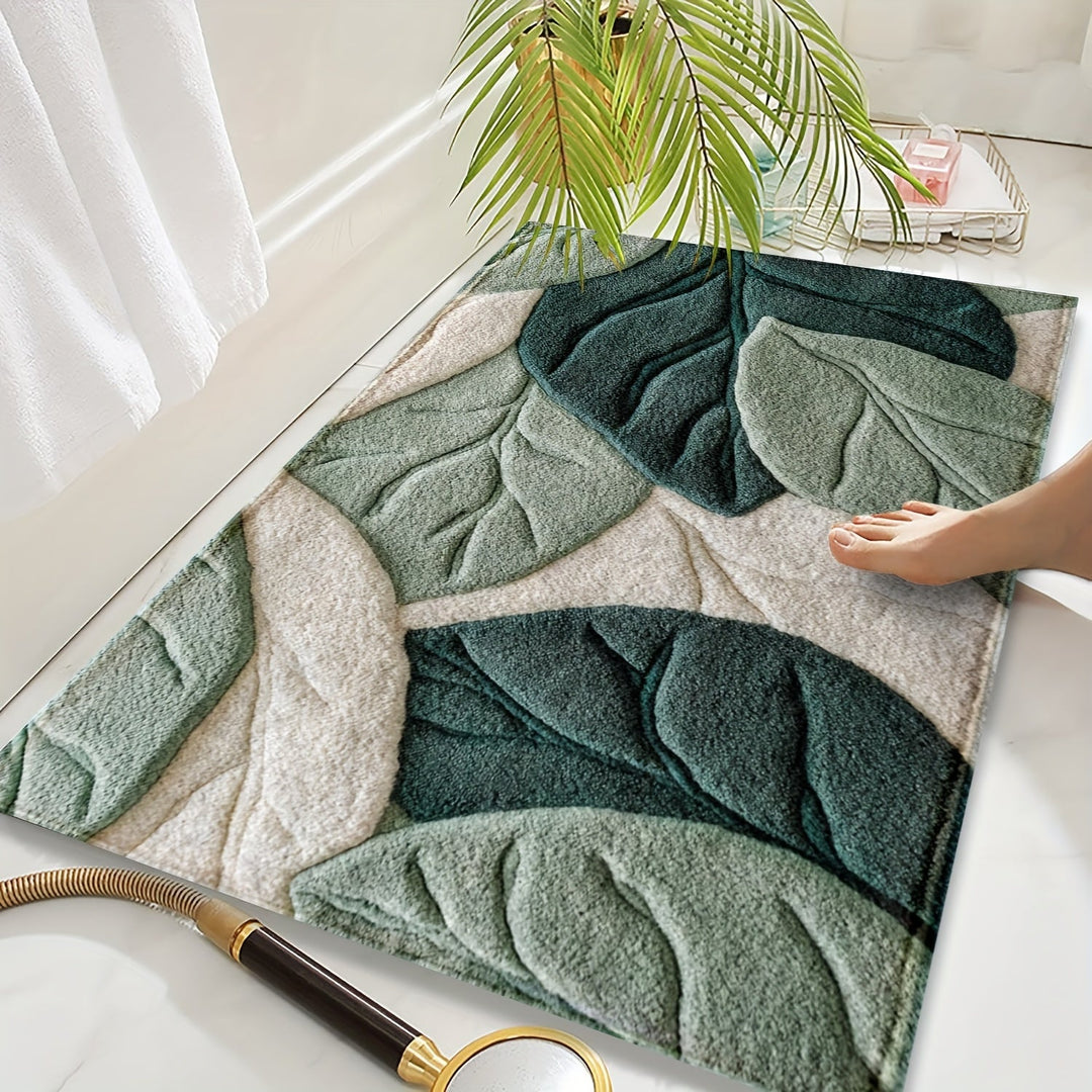 Tapis de bain vert absorbant en microfibre avec motif feuilles. Douillet et antidérapant pour salle de bain.