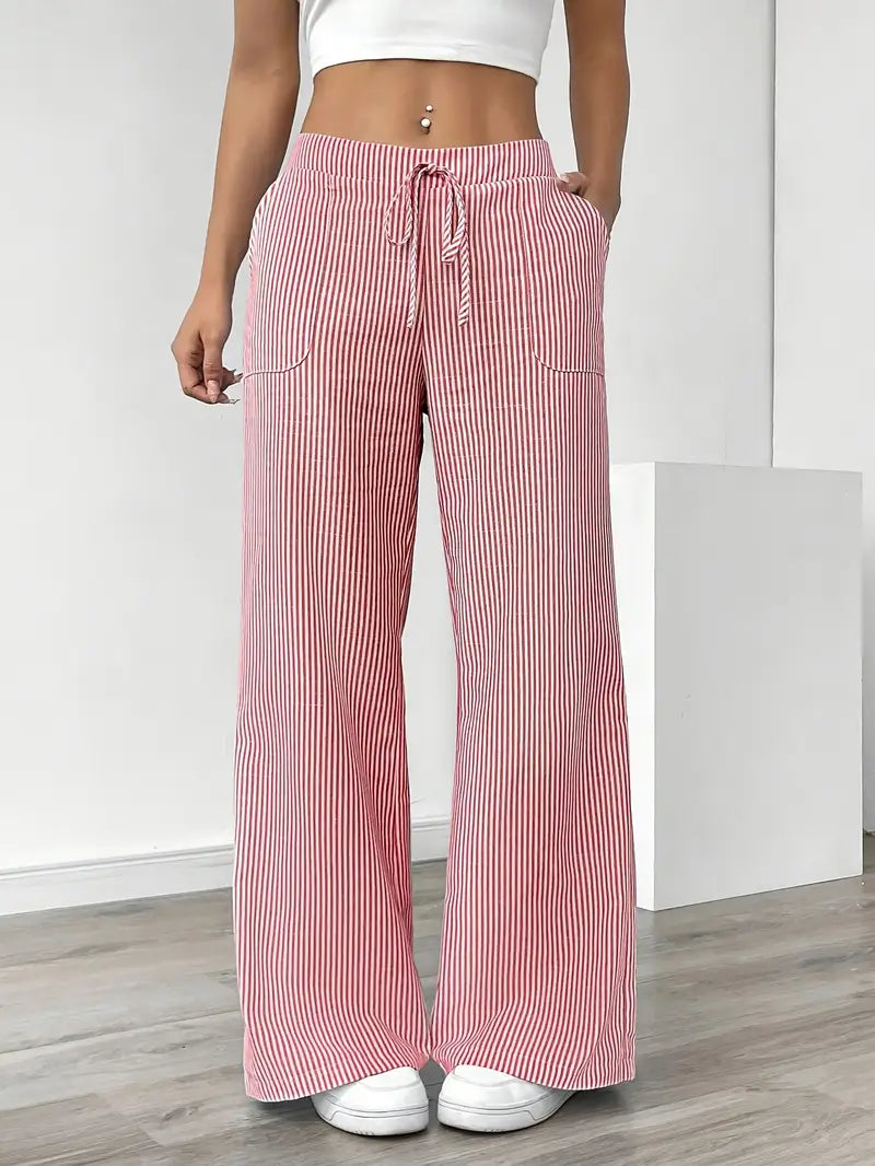 Pantalon femme taille haute, rayé, confortable et chic.