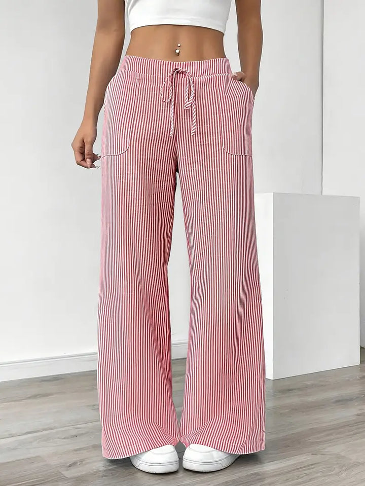 Pantalon femme taille haute, rayé, confortable et chic.