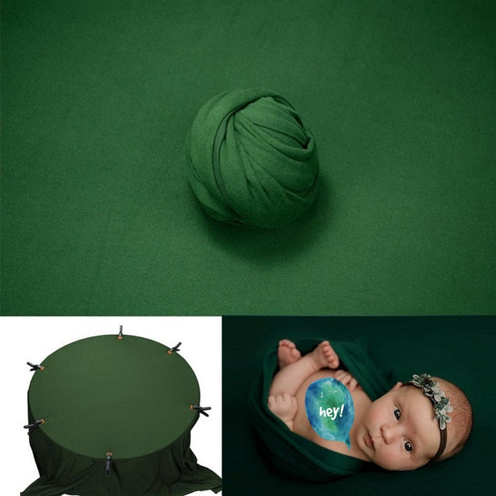 Kit photographie bébé avec couverture mousseline et toile de fond studio.
