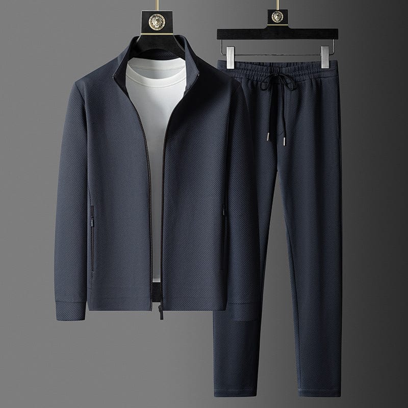 Veste zippée et pantalon ajusté d'un survêtement homme moderne et polyvalent pour tenue décontractée élégante.