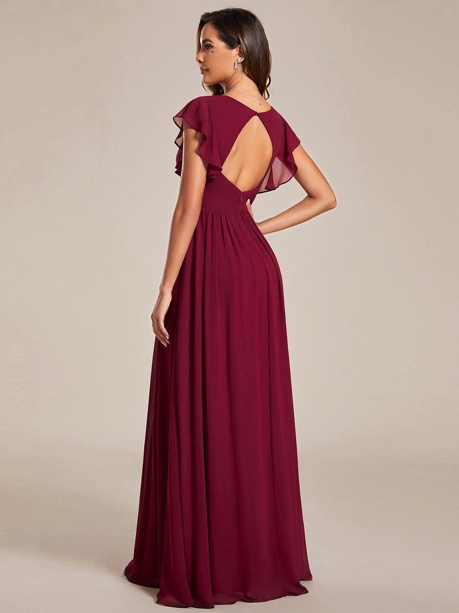 Vue arrière d'une robe maxi élégante, dos ouvert raffiné. Idéale pour cérémonie ou demoiselle d'honneur.