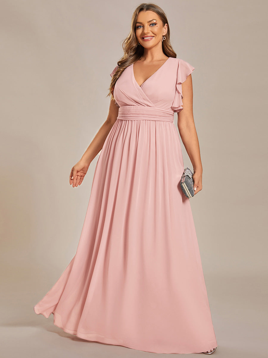 Robe de fête élégante, dos ouvert, manches courtes. Fluide et maxi pour une femme chic et pétillante.
