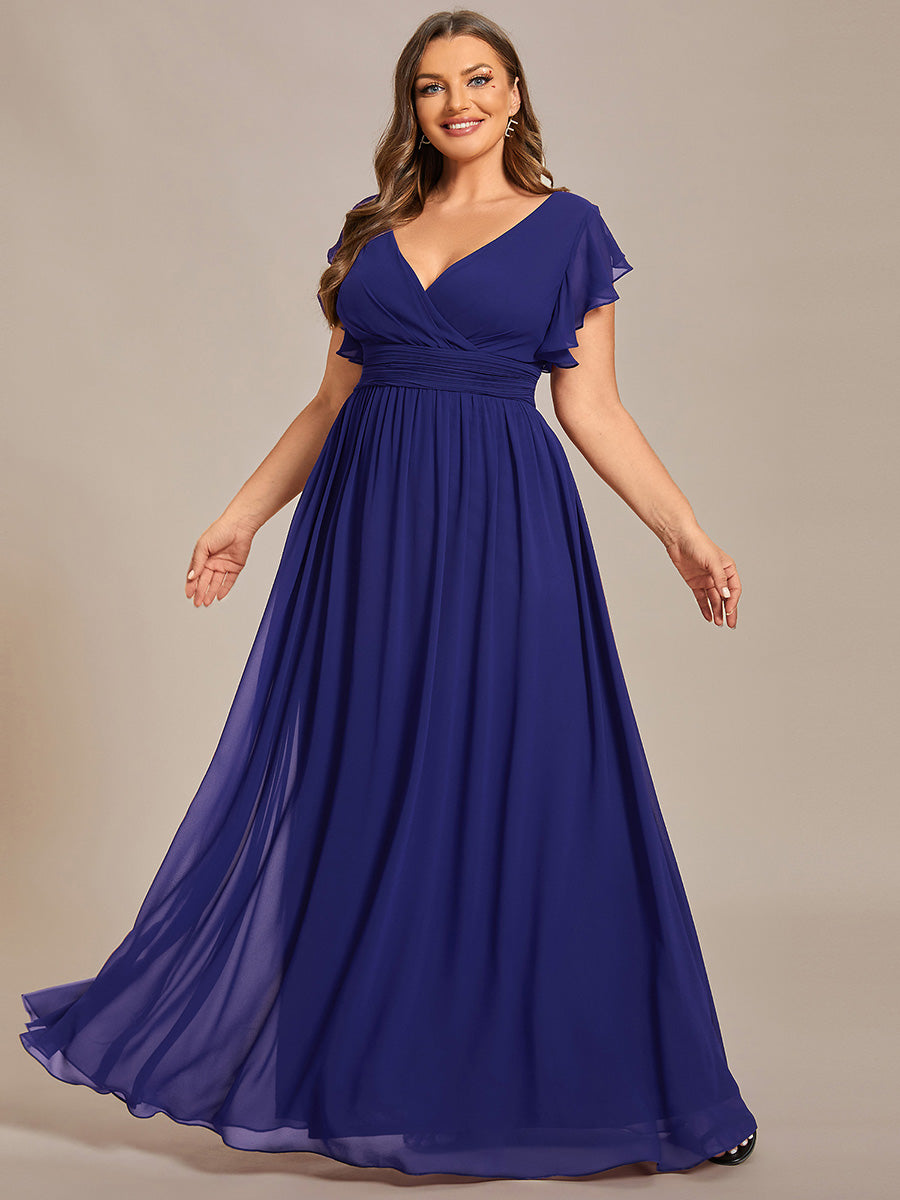Robe fluide, dos ouvert, col en V. Élégante pour demoiselle d'honneur, longue et pour cérémonie estivale chic.