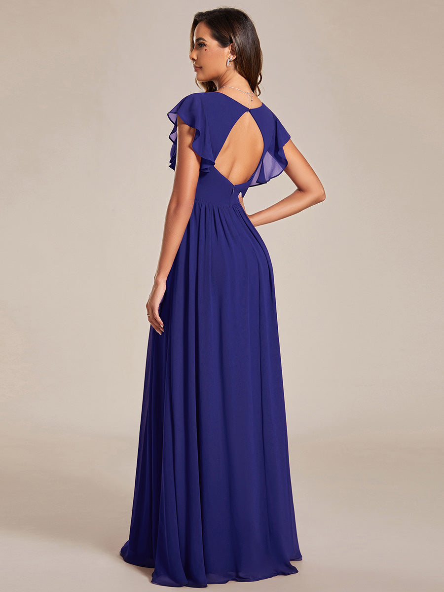 Robe longue femme, dos ouvert, col en V. Élégante pour une cérémonie ou soirée de printemps chic et bohème.