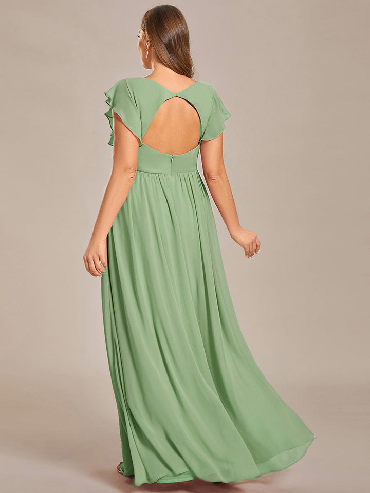 Robe de soirée élégante, dos ouvert, col en V. Fluide et maxi pour femme. Parfaite pour une fête chic et glamour.