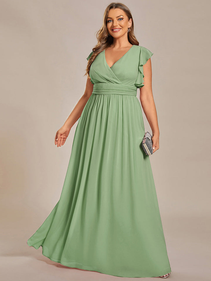 Robe de demoiselle d'honneur chic, dos ouvert, fluide. Idéale pour un mariage printanier élégant et féérique.