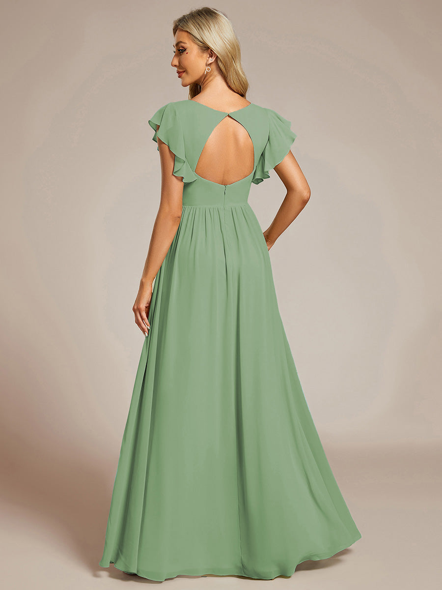 Robe de cérémonie femme, dos ouvert, col en V. Longue et fluide, parfaite pour le printemps et l'été chic.