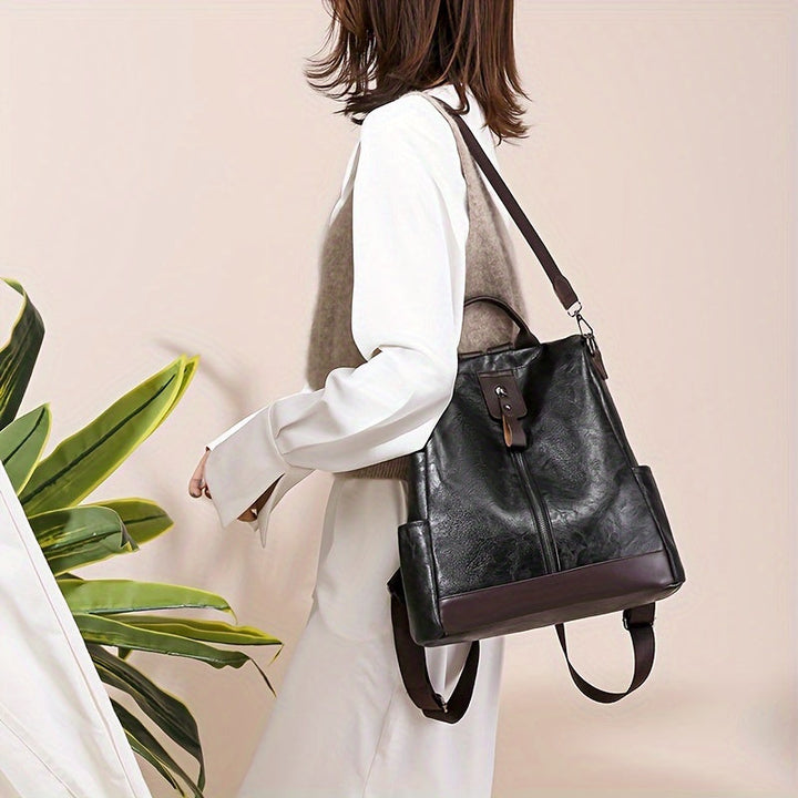 Sac à dos femme mode en cuir végétalien PU noir, design chic et élégant, parfait pour la ville.