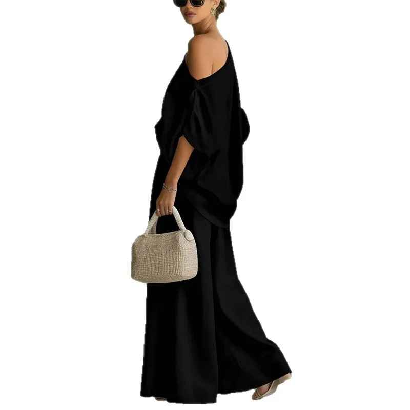 Ensemble deux pièces femme : top oversize à épaule dénudée et pantalon sarouel. Chic, confortable et style bohème.