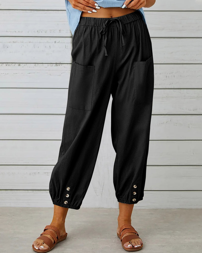 Pantalon sarouel femme ample et respirant, avec taille élastique pour un confort optimal. Parfait pour l'été.