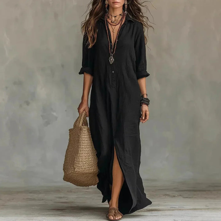 Robe chemise élégante femme, coupe maxi, manches trois-quarts, col et fente latérale. Idéale pour un look chic.