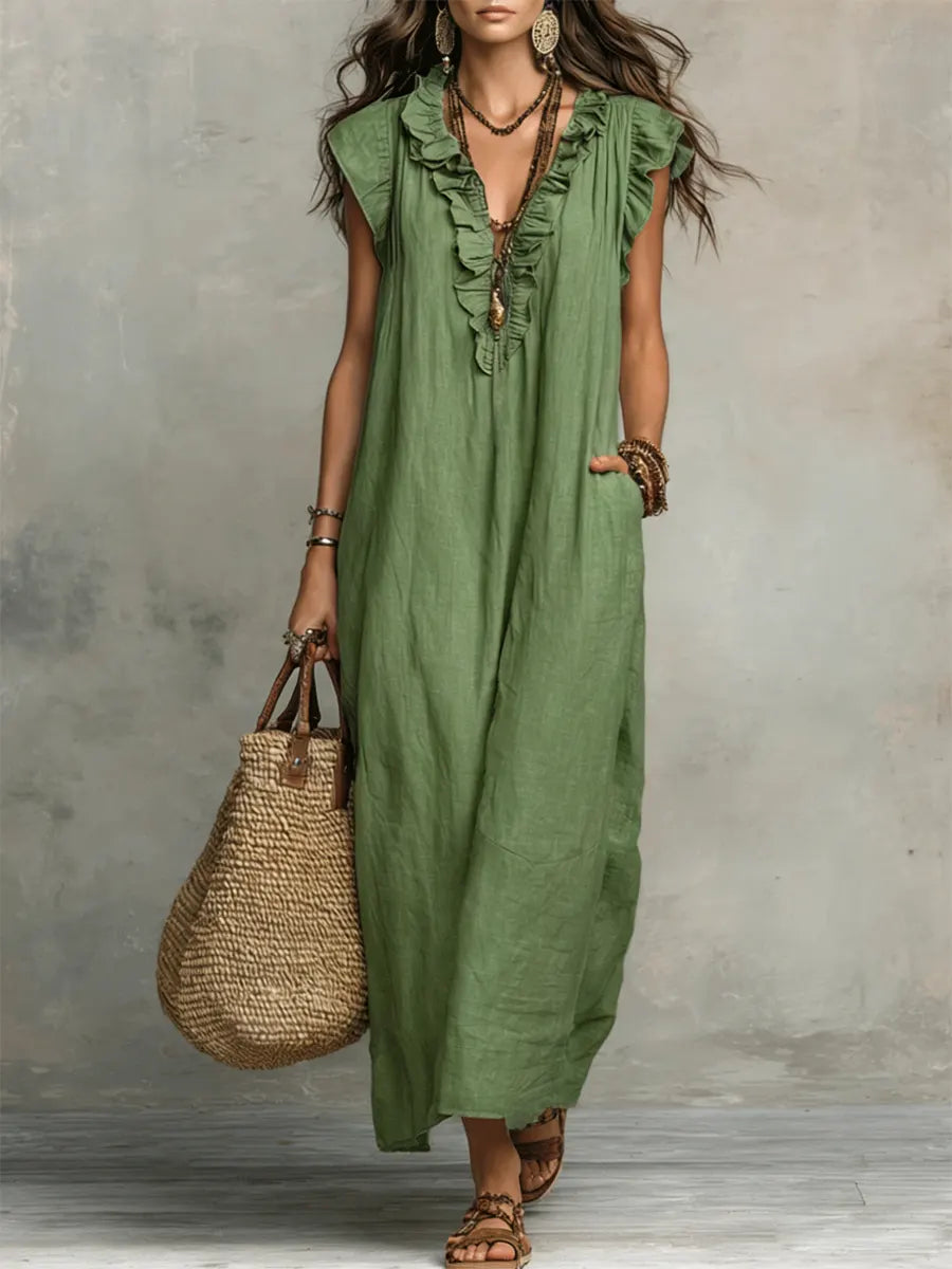 Robe maxi femme style bohème, avec col V, volants et poches, pour une élégance estivale tendance et confortable.