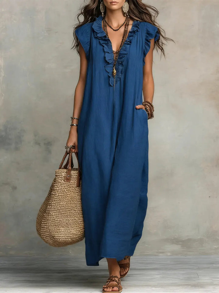 Robe d'été maxi bohème pour femme avec col V, volants fluides et un style décontracté et charmant.