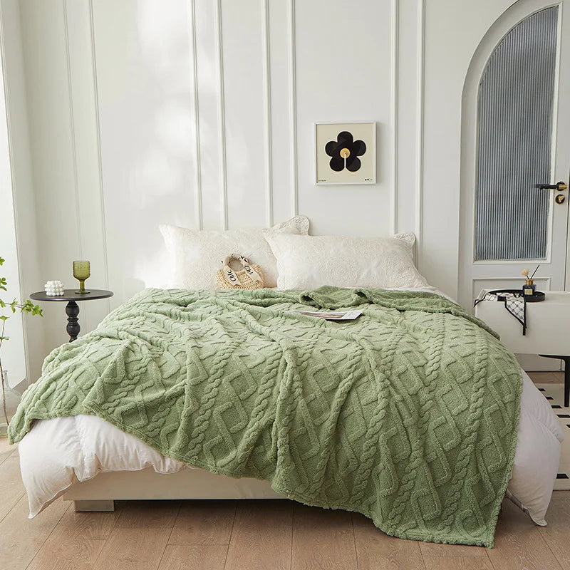 Jeté de canapé douillet, plaid réversible en laine d'agneau pour une décoration maison chaleureuse.