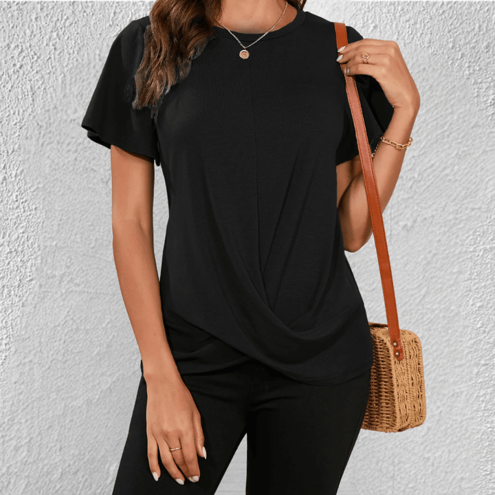 Découvrez ce haut femme confortable à col rond et manches courtes, conçu pour un effet ventre plat et un style chic.