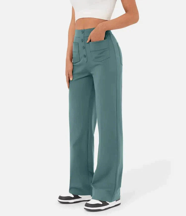 Pantalon femme extensible taille haute, avec poches, un must-have confortable et décontracté.