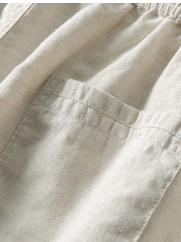 Ensemble coordonné homme : chemise col mao décontractée et pantalon regular fit pour un style estival.