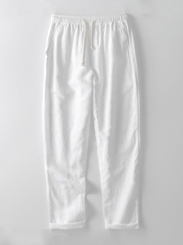 Mode homme été : ensemble complet avec chemise col mao et pantalon regular fit, look chic et confortable.