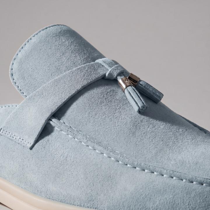 Mules homme à dos ouvert. Confort élégant avec boucle métallique. Idéales pour l'été.