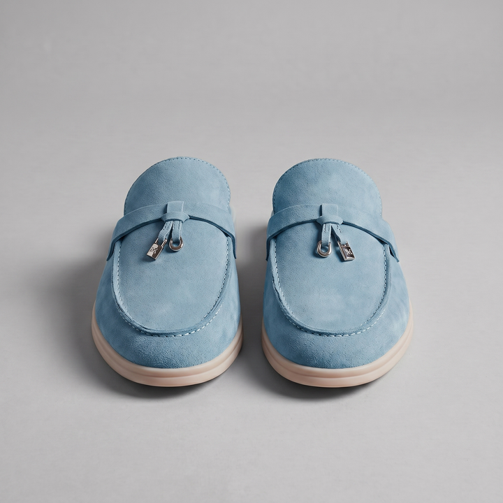 Loafers homme slip-on à dos ouvert, boucle métallique. Confort et style chic pour l'été.