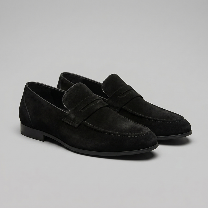 Paire de mocassins Penny homme, alliant style classique et confort pour une marche facile.