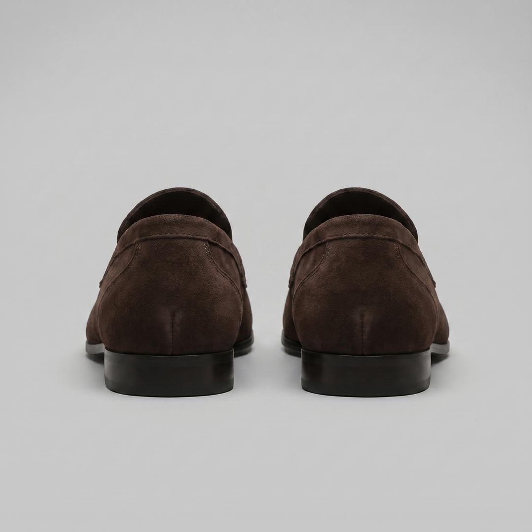 Mocassins Penny marron pour homme, des chaussures classiques et élégantes pour un style polyvalent.
