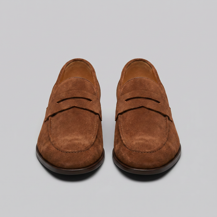 Mocassins Penny pour homme, chaussures de ville au design épuré, idéales pour un look soigné.