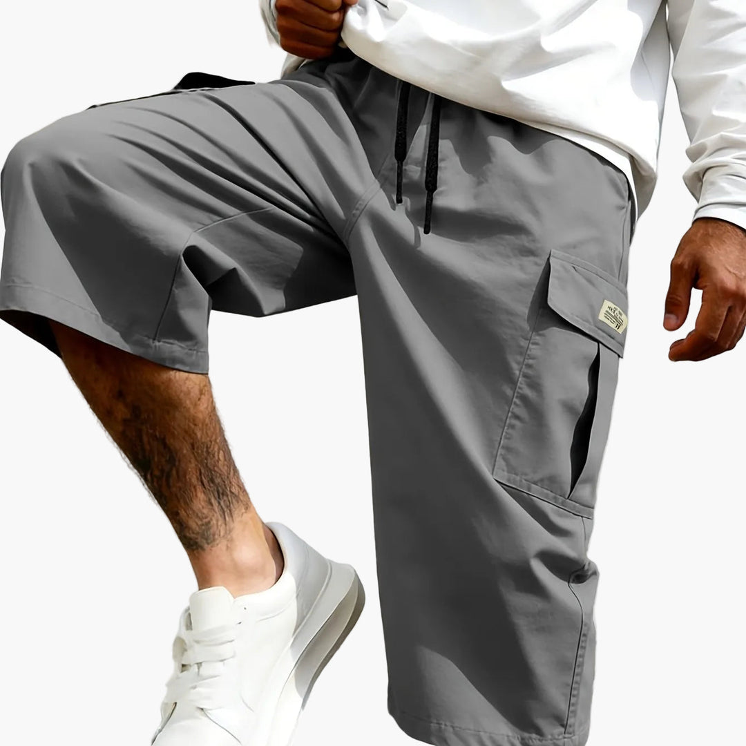 Short cargo homme trois quarts, style décontracté, cordon de serrage, poches plaquées, idéal pour l'été.