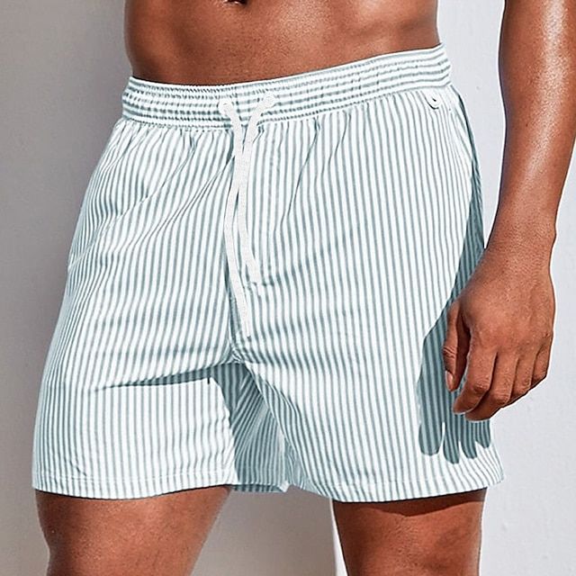 Boardshort homme à rayures avec cordon, confort estival pour nager et les activités de plage.