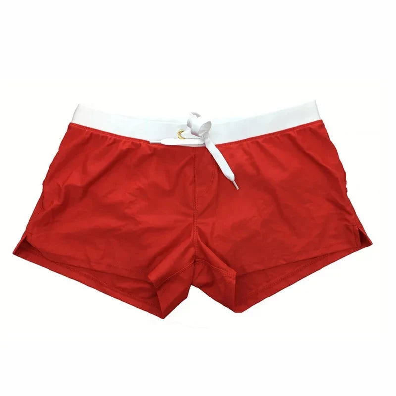 Short de bain homme séchage rapide. Confortable pour la plage, la natation et l'été en vacances.