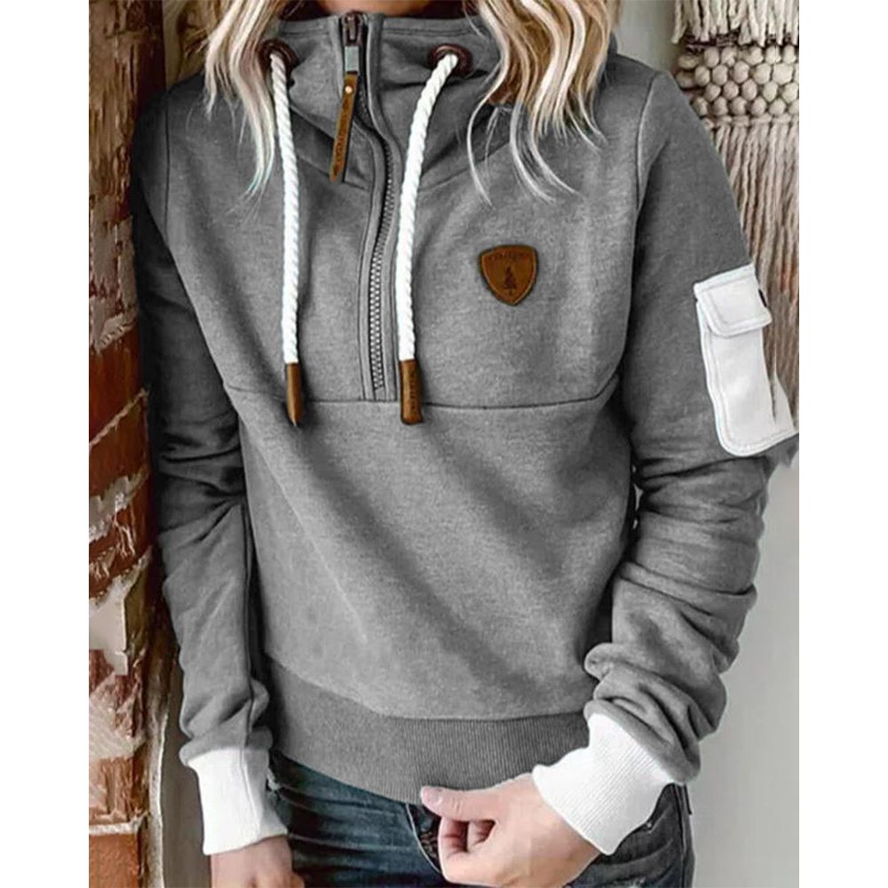 Sweat à capuche femme Aarohi, coupe décontractée vue de côté. Parfait pour un look confortable automne-hiver.