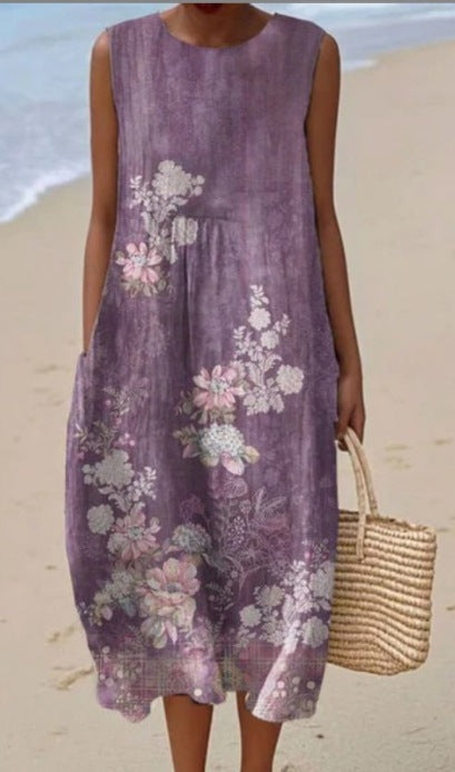 Élégante robe midi femme imprimée, sans manches, coupe fluide décontractée. Parfaite pour le style d'été.