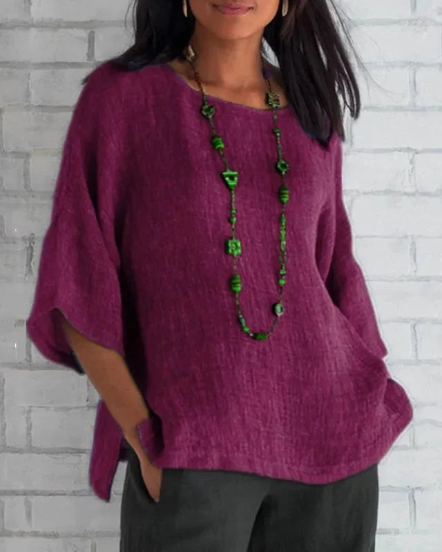 Chemise d'été fluide femme, manches trompette. Look décontracté chic pour un style sans effort.