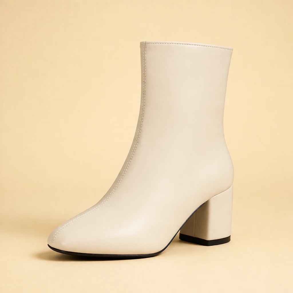 Bottines femme élégantes noires à bout carré, style moderne, idéales pour l'automne et l'hiver.