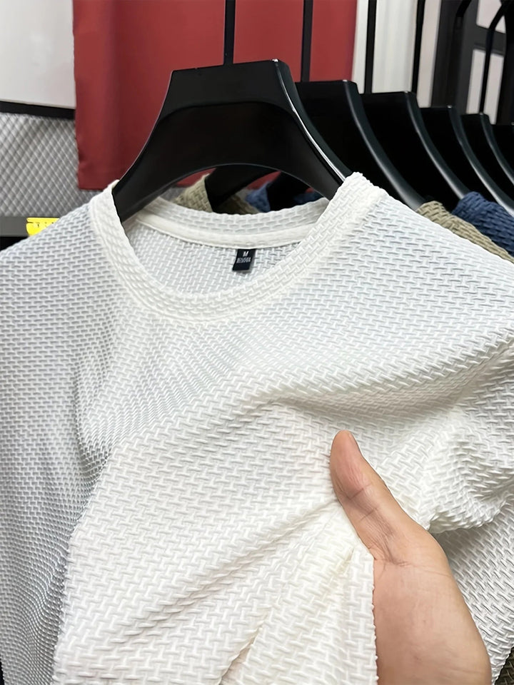 Chemise homme à manches courtes coupe slim, style pull décontracté à carreaux, idéale pour l'été.