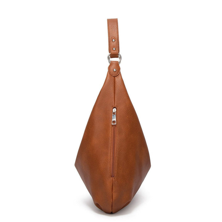 Sac cabas femme chic pour la ville ou le travail. Design élégant et décontracté, parfait pour un look quotidien.