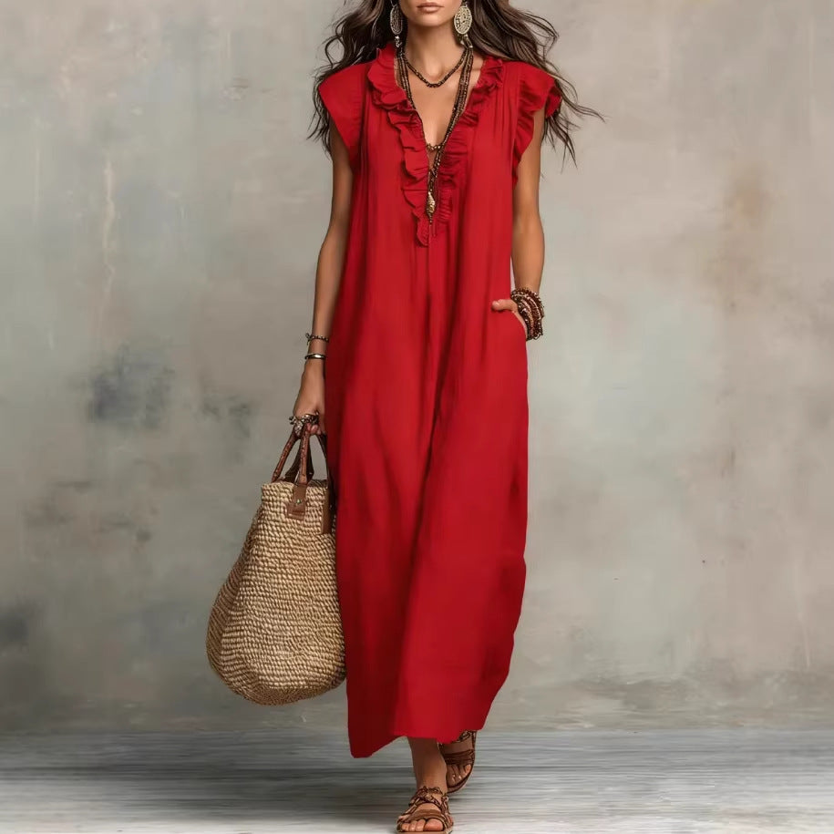 Vêtement femme: Robe maxi sans manches fluide, élégante, avec volants et poches. Idéale pour le printemps/été.