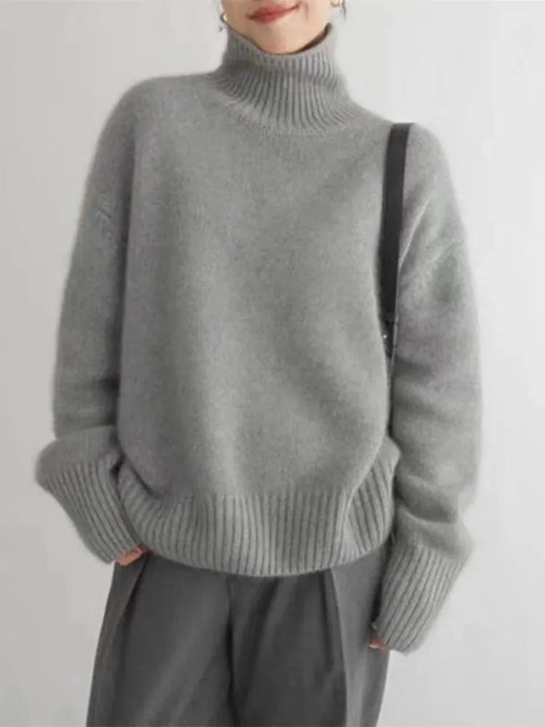 Pull chaud et confortable pour femme avec col roulé, en maille épaisse, essentiel pour l'hiver.