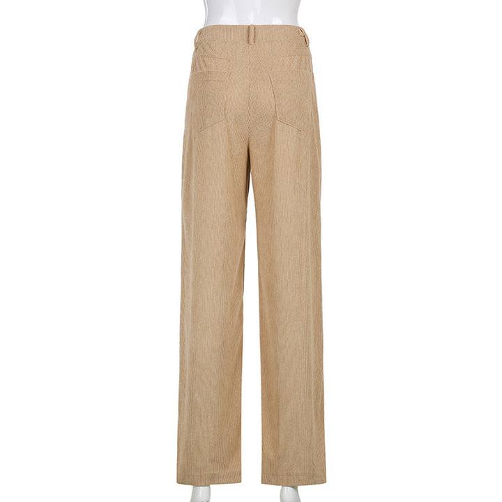 Pantalon large côtelé femme beige, bas fluide et décontracté, idéal pour une mode féminine printanière.