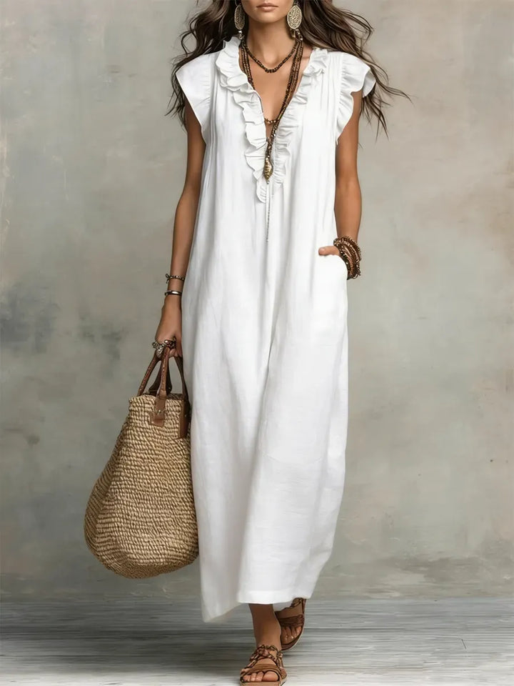 Robe maxi femme élégante et décontractée, fluide, sans manches, avec poches et volants. Idéale pour le temps chaud.